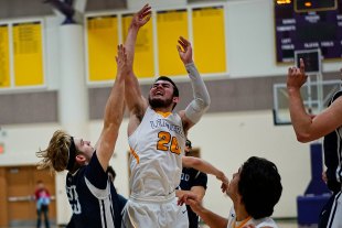 Tiger hoopsters improved to 2-1 in WYL, host El Diamante Thursday night Kent Lambert in Thursday's game against Redwood.